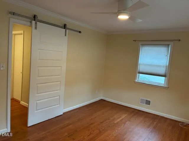 a view of small space with wooden floor