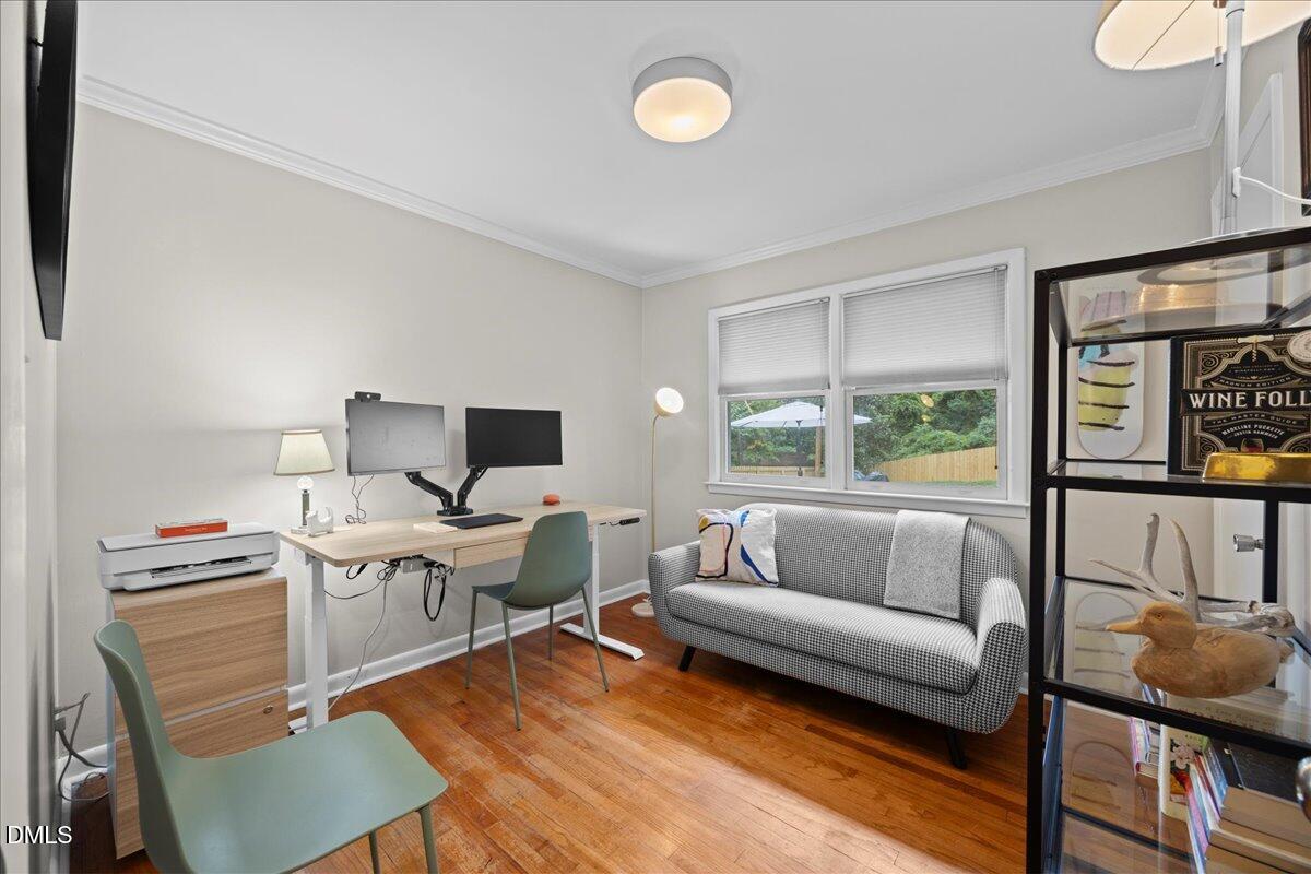 1212 Brookside Drive Raleigh, NC 27604 - Photo 33 of 42 a living room with furniture and a window
