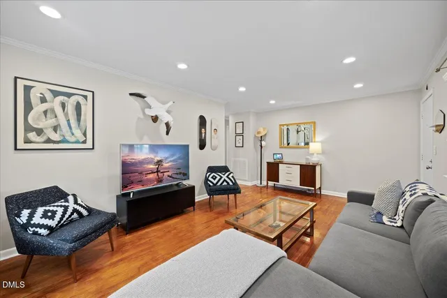 a kitchen with a sink cabinets and a window