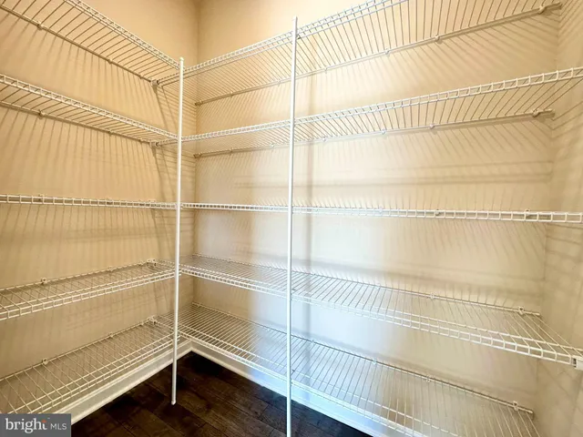 a empty room with a wooden floor