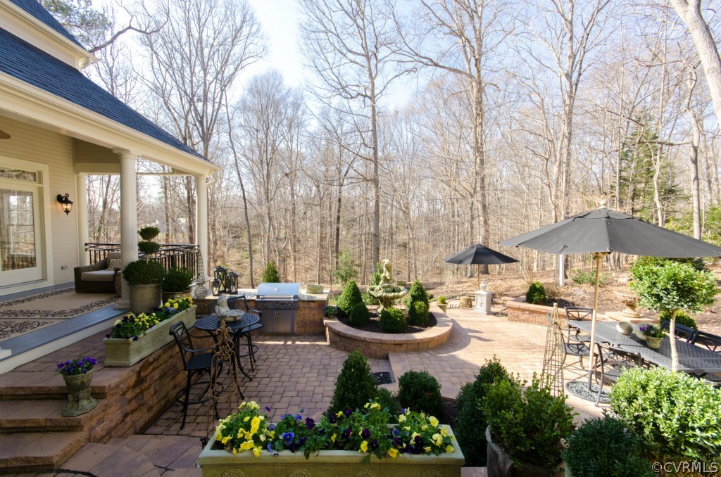 4200 Reeds Landing Circle Midlothian, VA 23113 - Photo 14 of 24 a view of a patio with chairs and plants