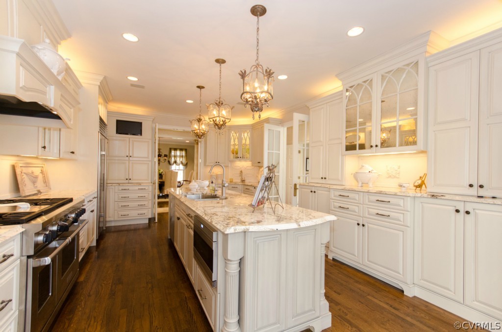 4200 Reeds Landing Circle Midlothian, VA 23113 - Photo 23 of 24 a kitchen with a sink stove and cabinets
