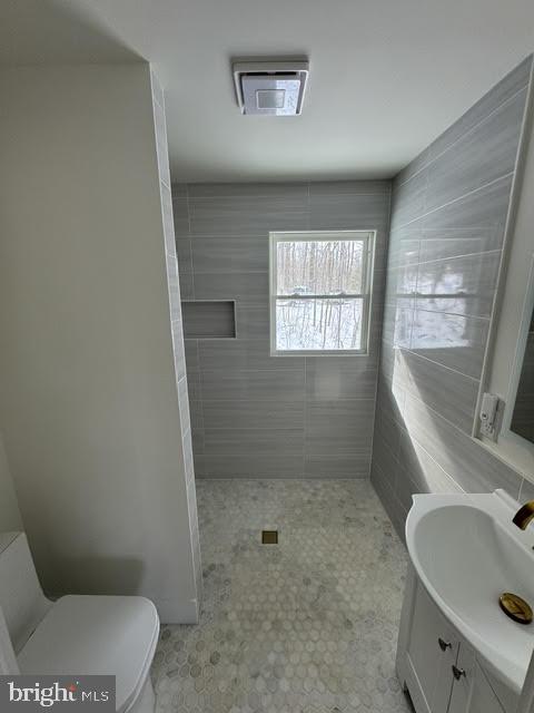 267 Buck Road Linden, VA 22642 - Photo 12 of 37 a bathroom with a sink toilet and window