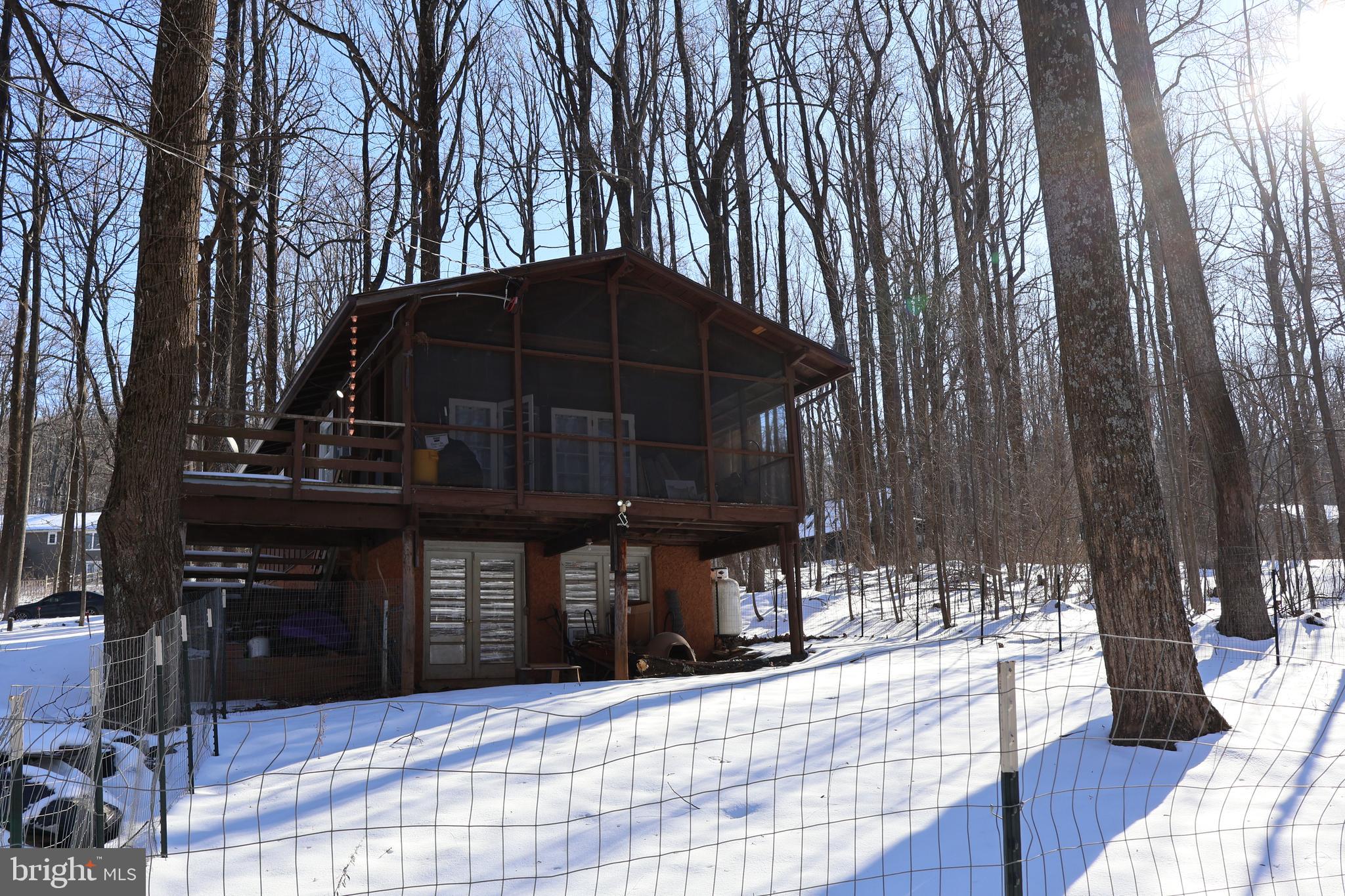 267 Buck Road Linden, VA 22642 - Photo 2 of 37 a view of a house with backyard and sitting area