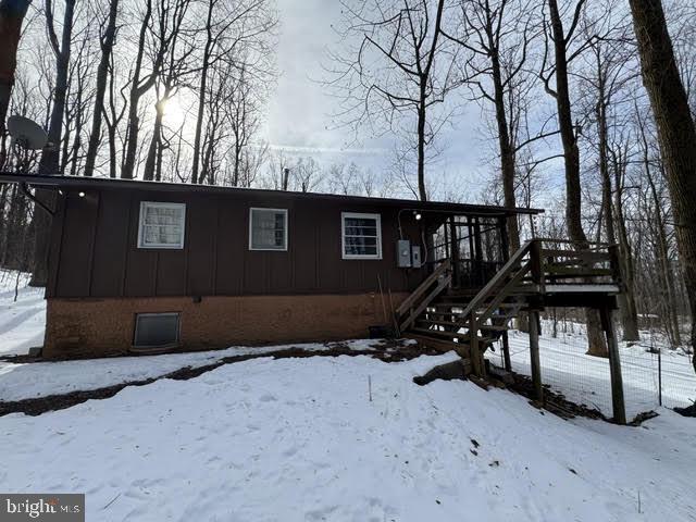 267 Buck Road Linden, VA 22642 - Photo 9 of 37 a picture of a bench in a backyard
