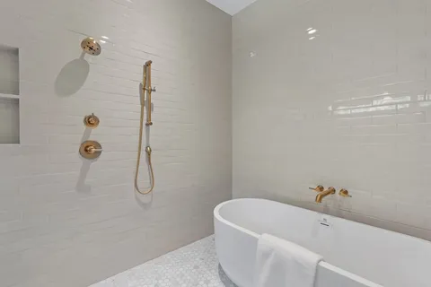 a kitchen with a refrigerator and a window