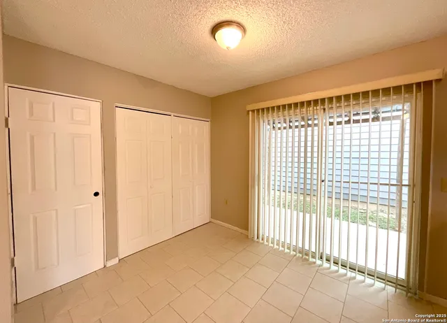 a view of a room with a large window