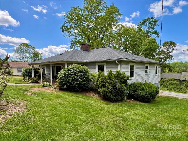 a view of a house with a garden