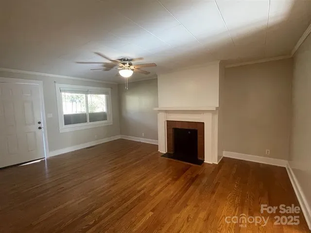 a kitchen with a cabinets and a stove top oven