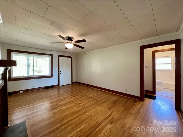 a kitchen with a refrigerator and a sink