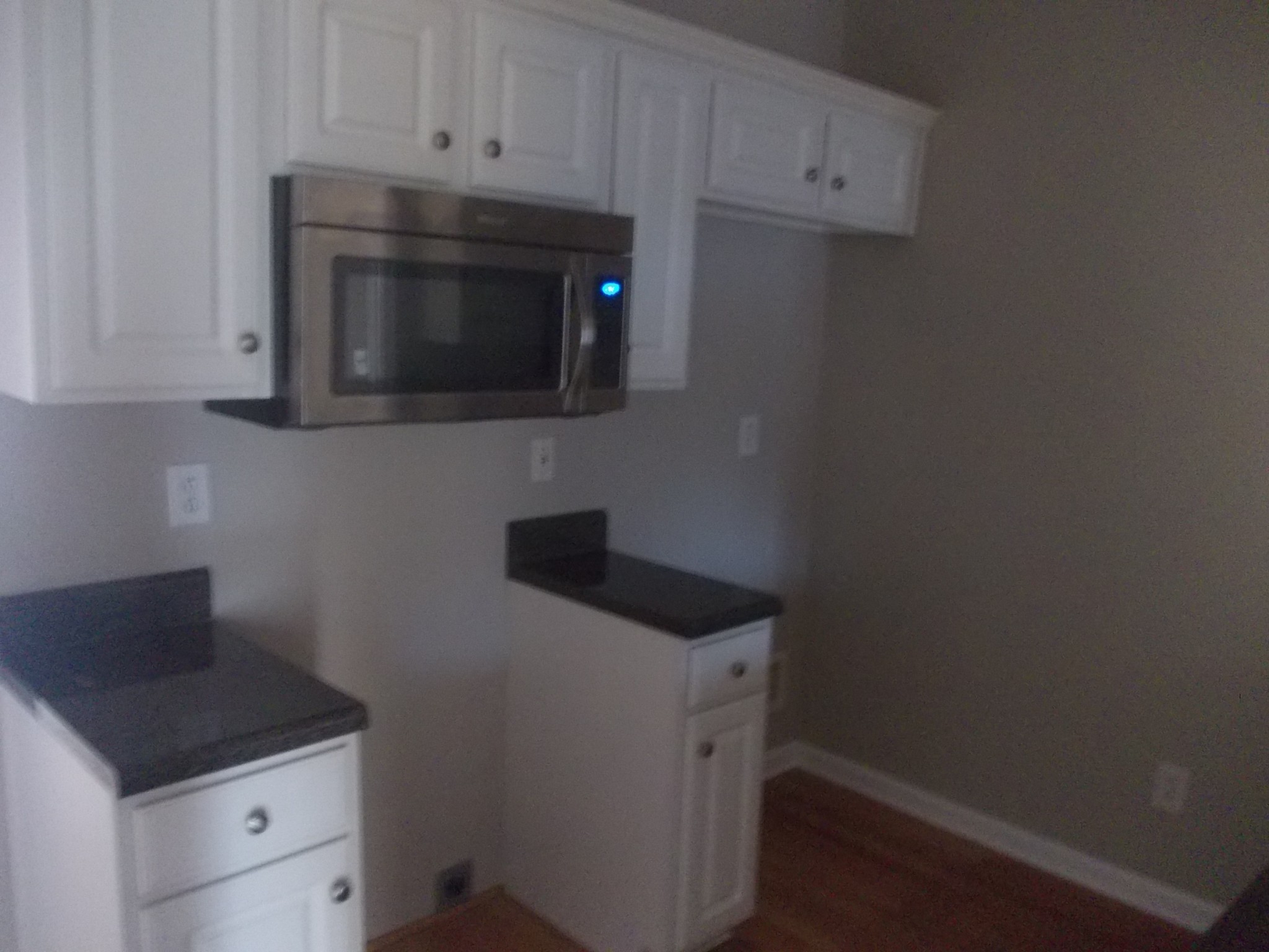 1508 Beaus Way Madison, TN 37115 - Photo 11 of 16 a kitchen with a stove and a microwave