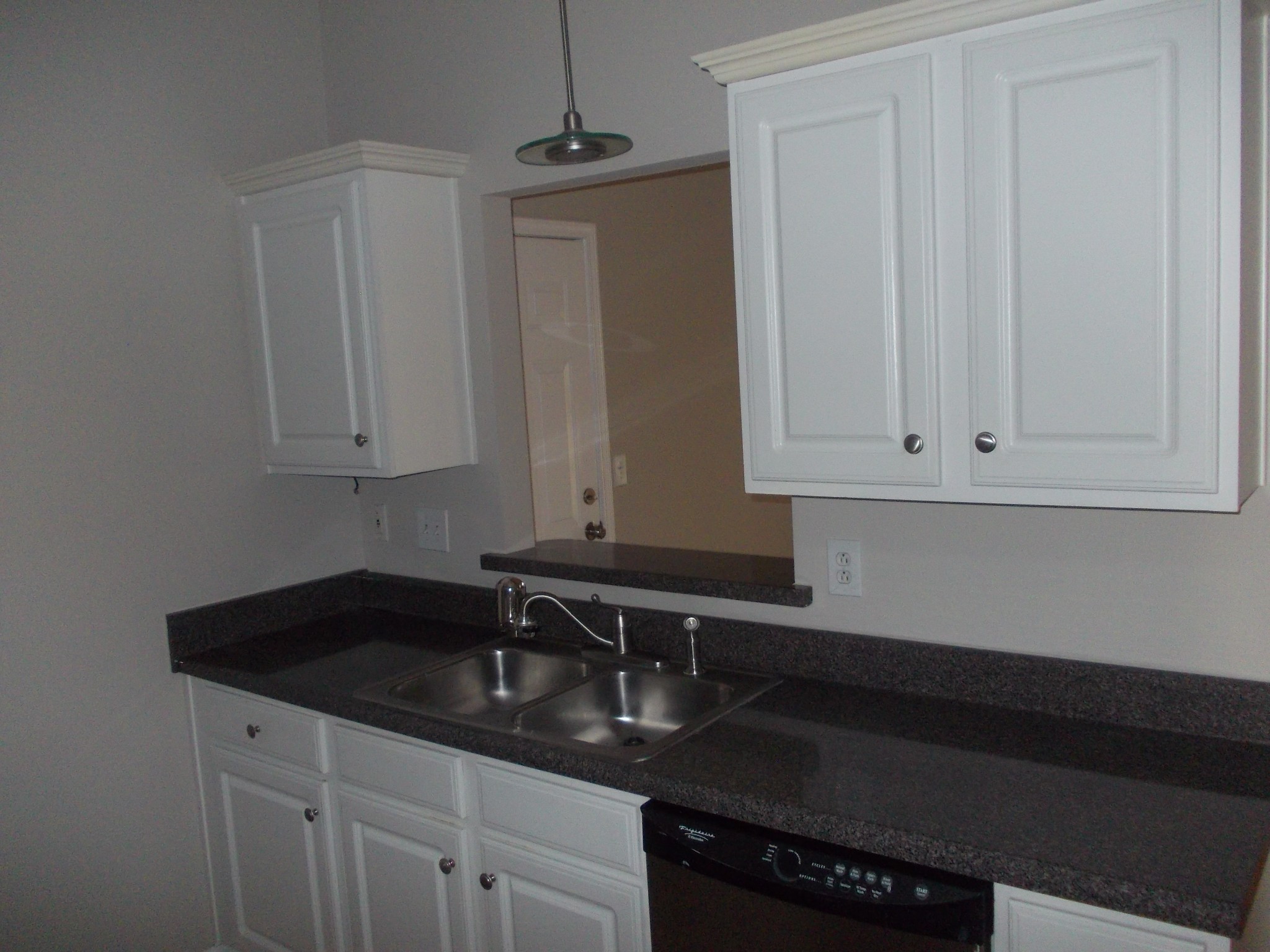 1508 Beaus Way Madison, TN 37115 - Photo 12 of 16 a kitchen with granite countertop white cabinets and sink