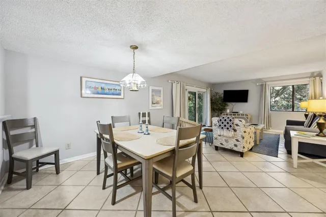 a view of a livingroom with furniture and window