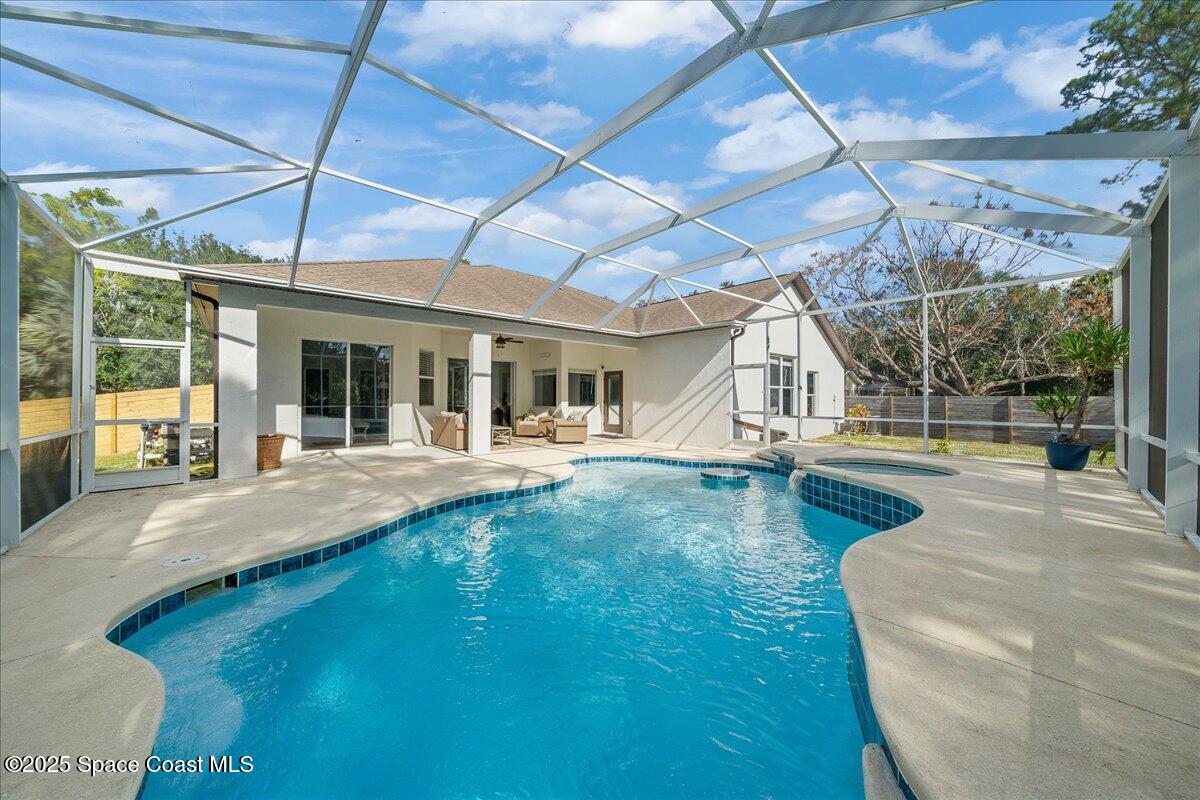 2409 Granger Road Cocoa, FL 32926 - Photo 26 of 36 a view of house with swimming pool