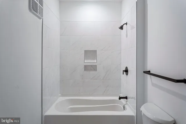 a bathroom with a bathtub