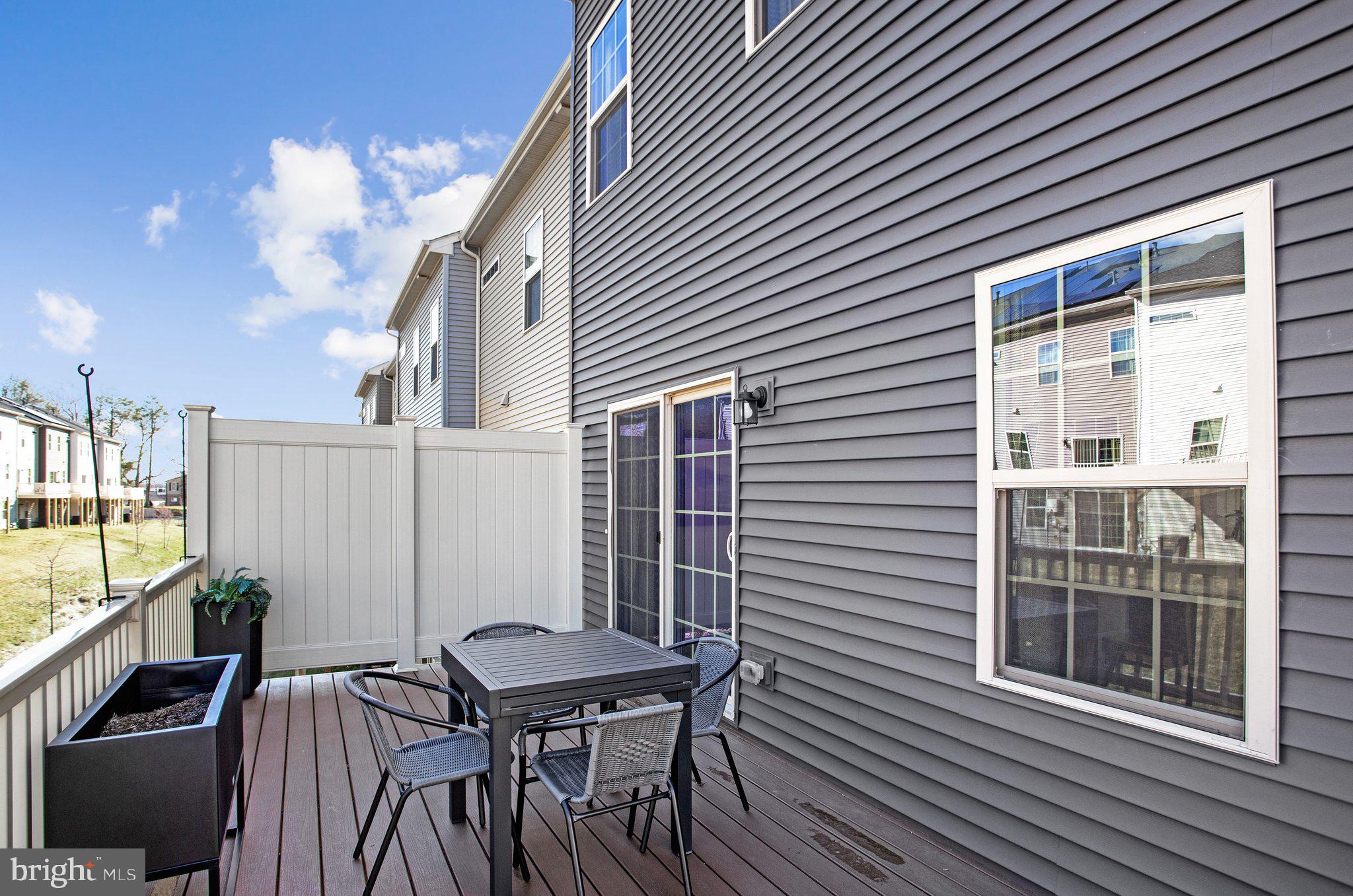 9012 Waller Tree Way Upper Marlboro, MD 20772 - Photo 24 of 29 a view of a house with backyard and sitting area