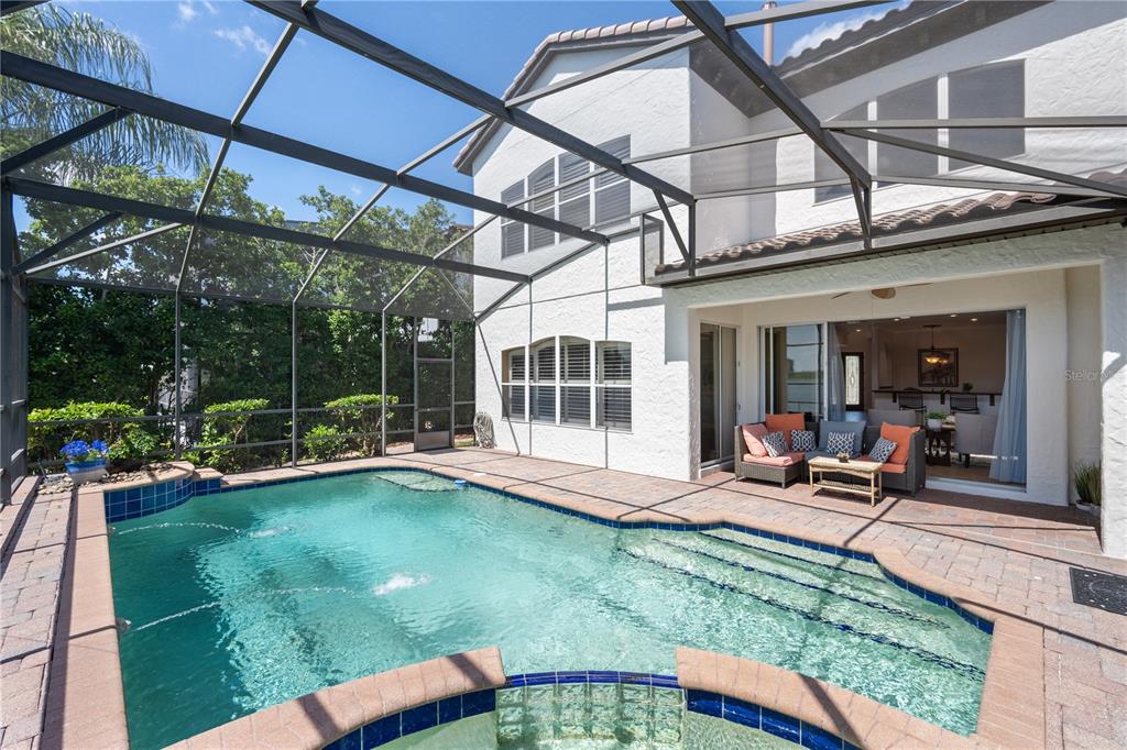 8119 Vía Rosa Orlando, FL 32836 - Photo 35 of 62 a view of a house with backyard sitting area and garden