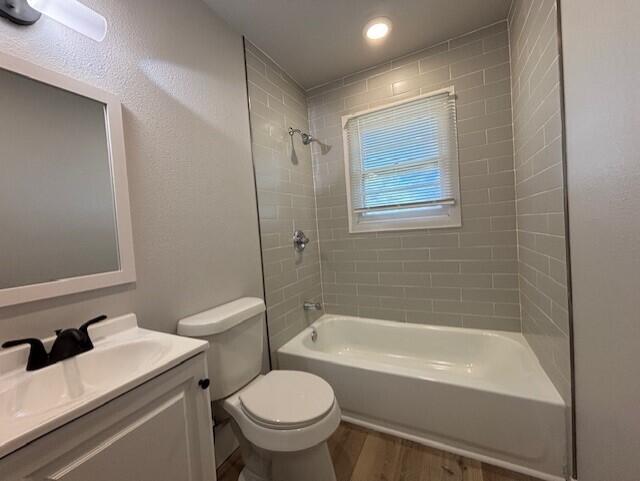 4410 43rd Street Lubbock, TX 79414 - Photo 6 of 9 a bathroom with a sink toilet and bathtub