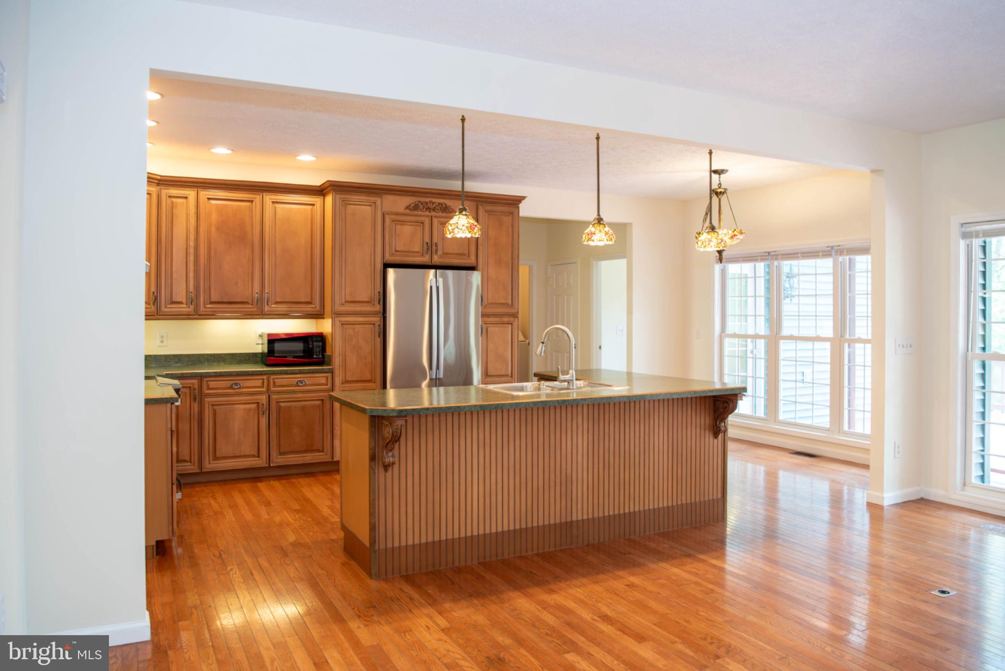 792 Forest Glen Road Moorefield, WV 26836 - Photo 37 of 146 Inviting kitchen with warm wood tones.
