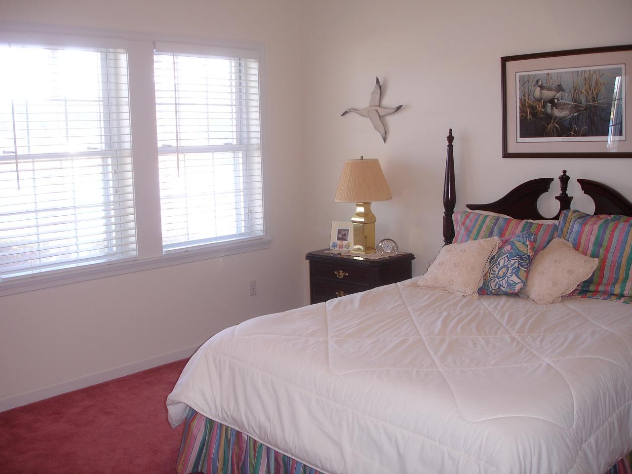 842 Cove Road Penhook, VA 24137 - Photo 11 of 22 a bedroom with bed and window