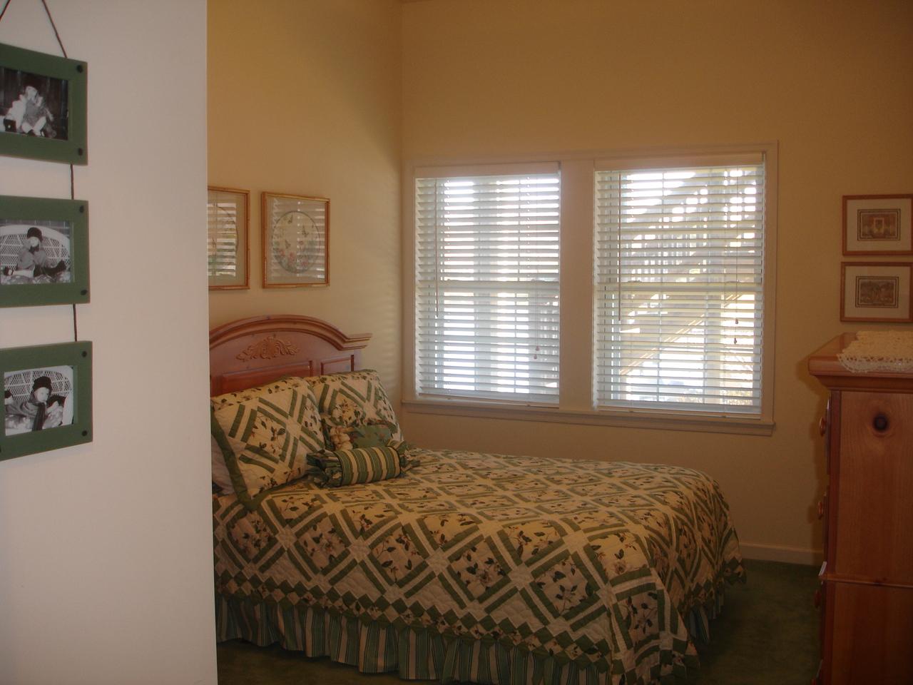 842 Cove Road Penhook, VA 24137 - Photo 14 of 22 a bedroom with a bed and a window