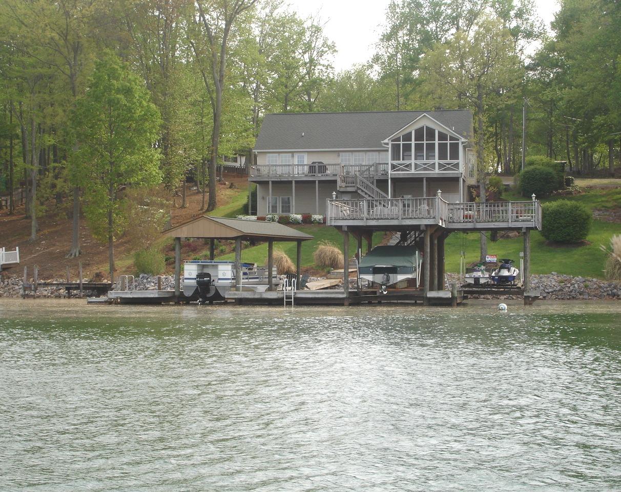 842 Cove Road Penhook, VA 24137 - Photo 22 of 22 a view of a house with a yard and sitting area