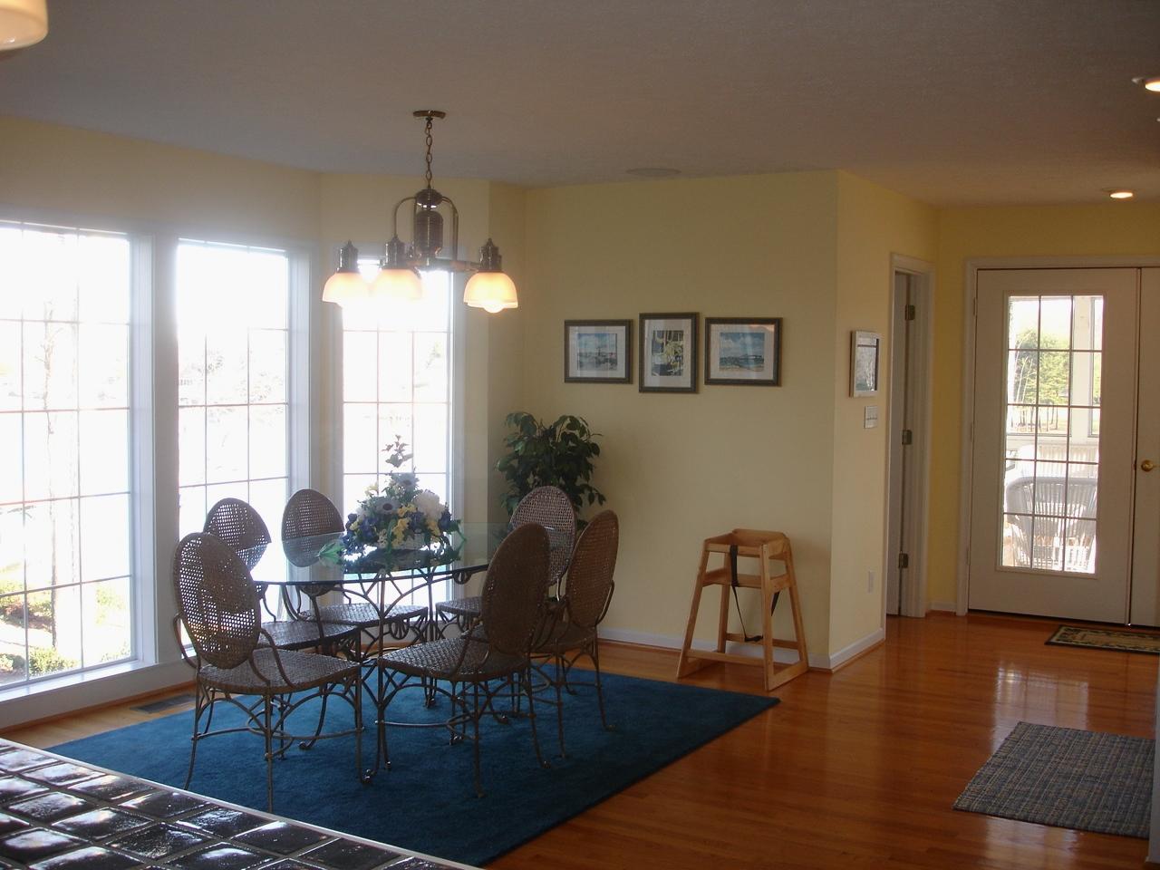 842 Cove Road Penhook, VA 24137 - Photo 6 of 22 a dining room with furniture window wooden floor