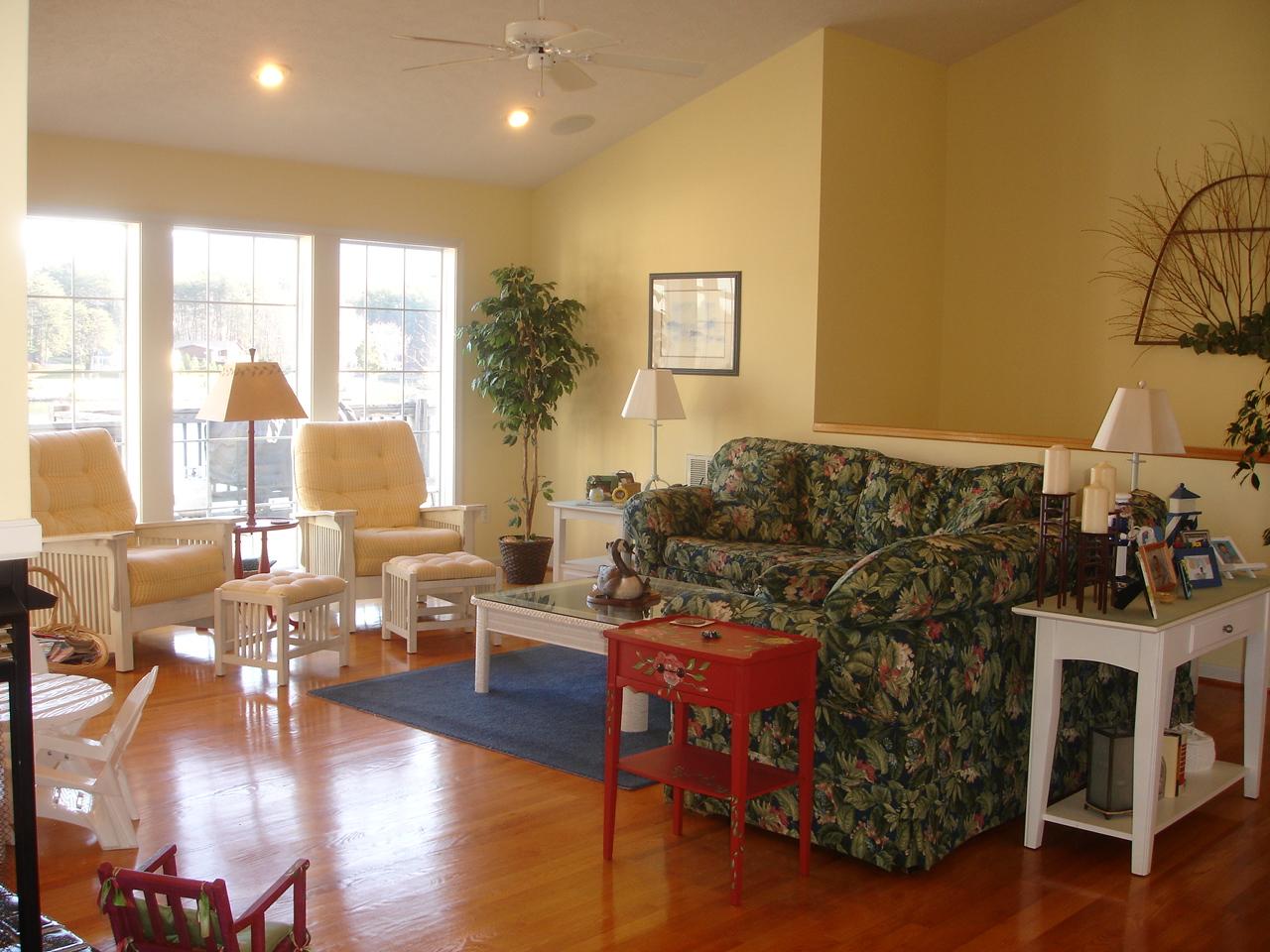 842 Cove Road Penhook, VA 24137 - Photo 8 of 22 a living room with furniture and a wooden floor