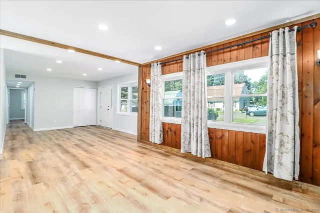 a view of an empty room and window