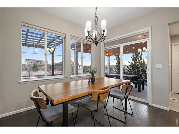 a bathroom with a sink vanity mirror toilet and bathtub