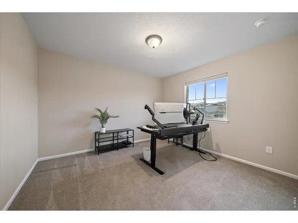 a bathroom with a double vanity sink mirror and toilet