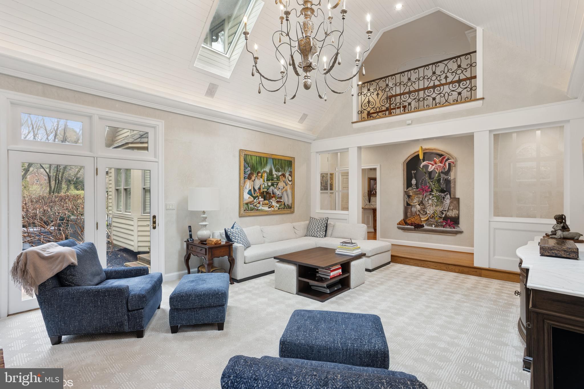 1308 Musgrove Road Lutherville-Timonium, MD 21093 - Photo 11 of 79 a living room with furniture a chandelier and a painting on the wall