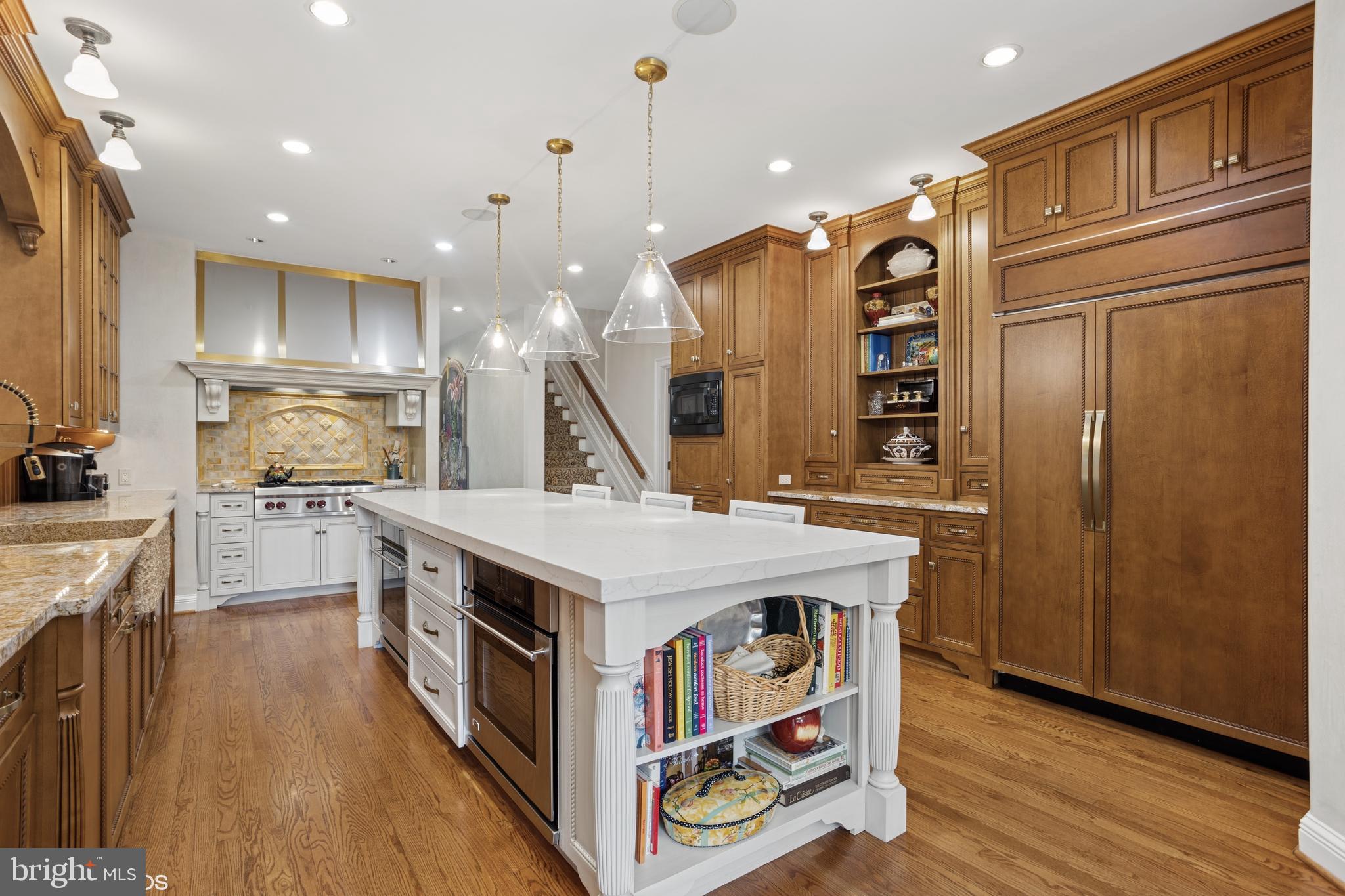 1308 Musgrove Road Lutherville-Timonium, MD 21093 - Photo 17 of 79 a kitchen with stainless steel appliances granite countertop a stove a refrigerator and a oven
