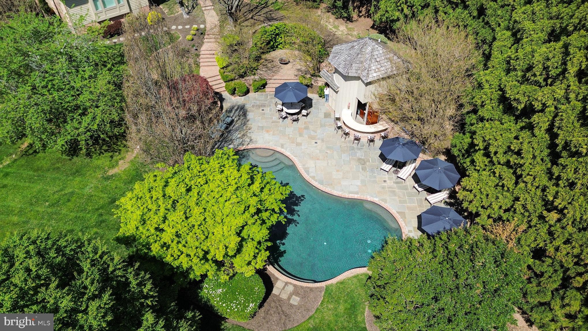 1308 Musgrove Road Lutherville-Timonium, MD 21093 - Photo 3 of 79 an aerial view of a house with a yard and green space