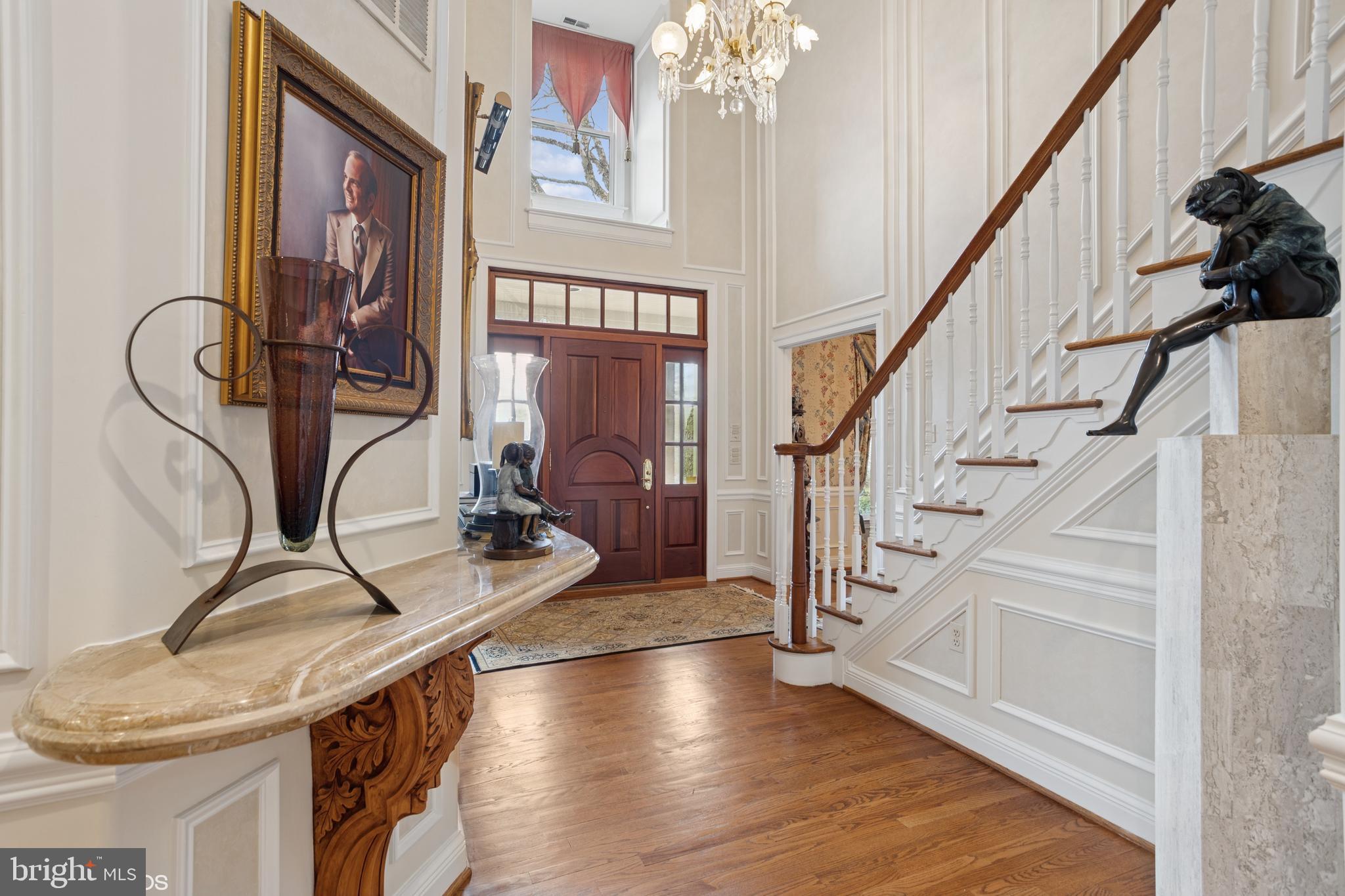 1308 Musgrove Road Lutherville-Timonium, MD 21093 - Photo 31 of 79 a view of entryway and hall with wooden floor