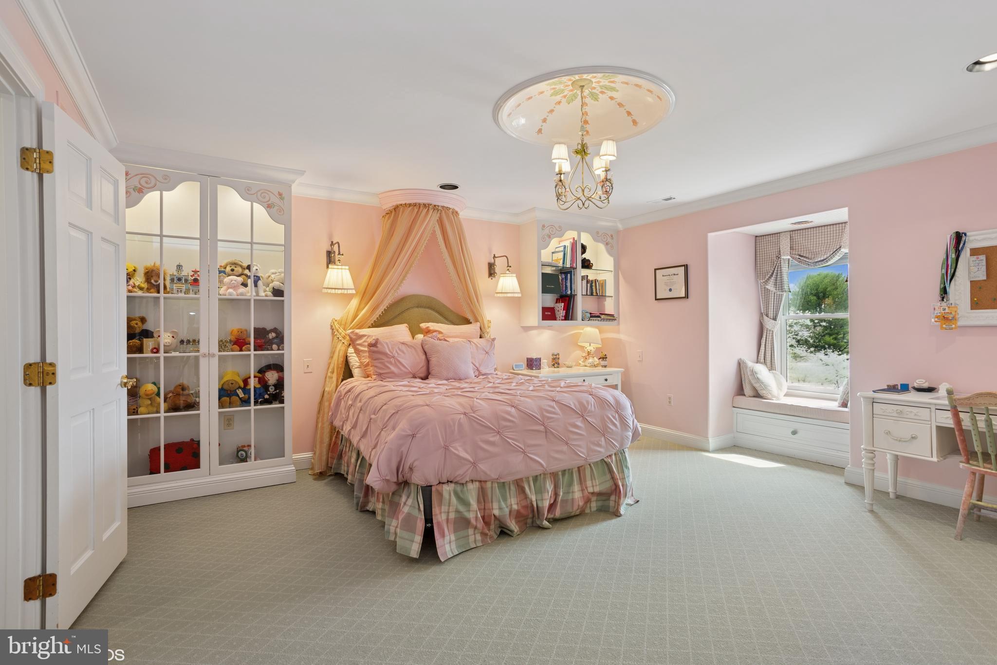 1308 Musgrove Road Lutherville-Timonium, MD 21093 - Photo 36 of 79 a spacious bedroom with a bed a table and windows