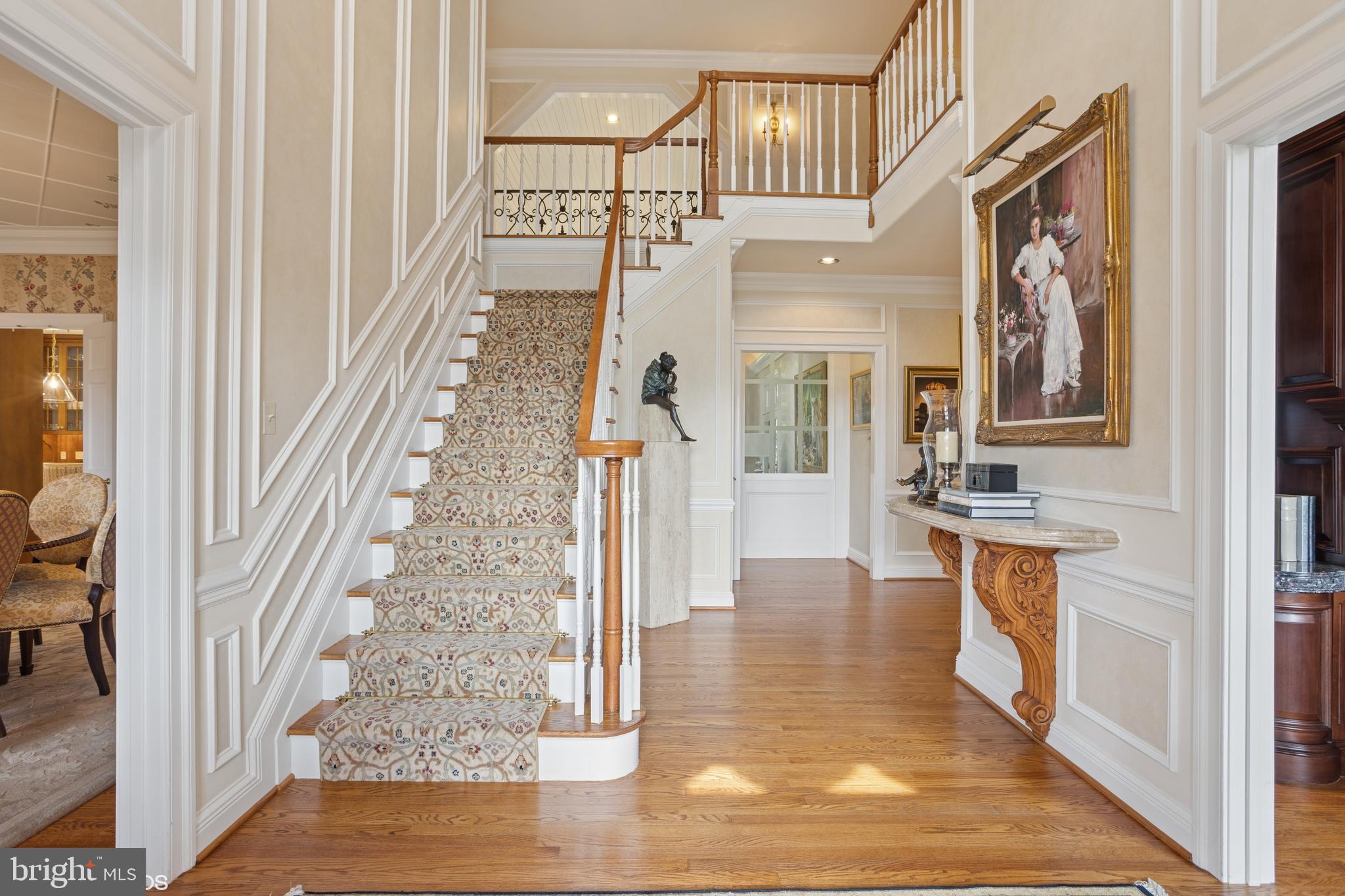 1308 Musgrove Road Lutherville-Timonium, MD 21093 - Photo 8 of 79 a view of a hallway with wooden floor and staircase