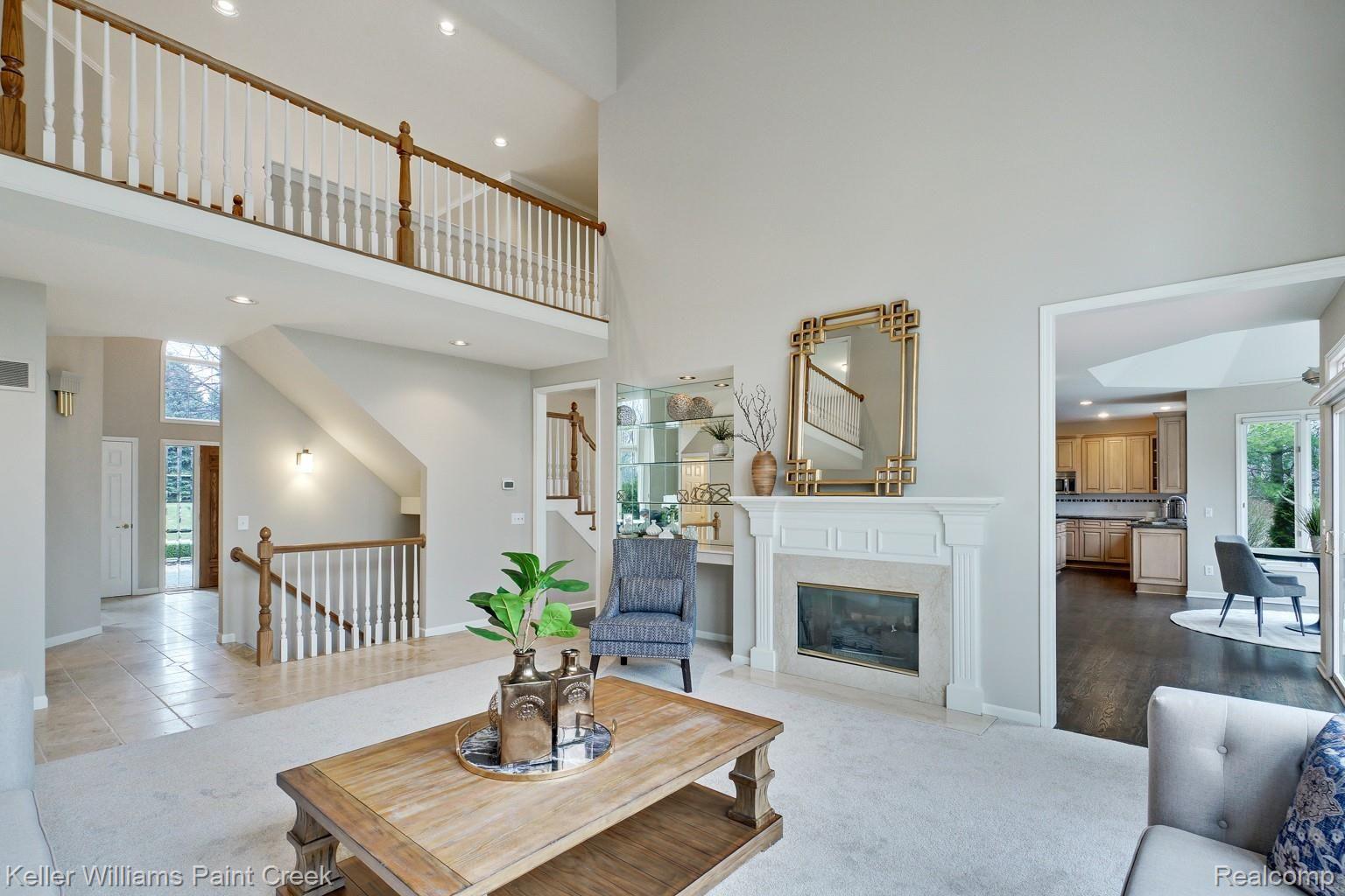 3473 Moceri Court Rochester, MI 48306 - Photo 21 of 58 Open staircase offers airy feeling in the two-story Family Room