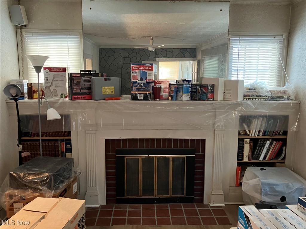 1058 Pembrook Road Cleveland Heights, OH 44121 - Photo 18 of 39 Detailed view of a fireplace and a textured wall