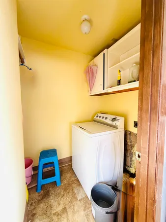 a bathroom with a toilet and a sink