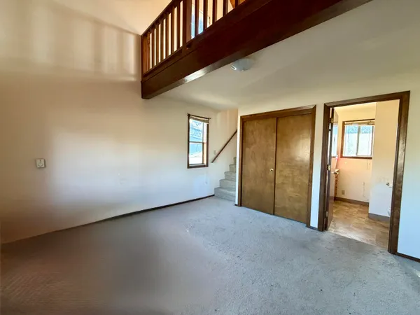 an empty room with windows