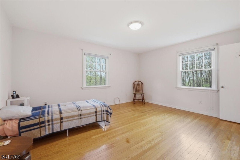 9 Henderson Hill Road Hampton, NJ 08827 - Photo 15 of 36 a bedroom with bed and window