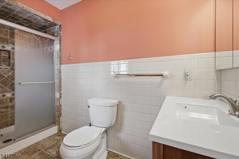 9 Henderson Hill Road Hampton, NJ 08827 - Photo 17 of 36 a white toilet sitting next to a bathroom sink