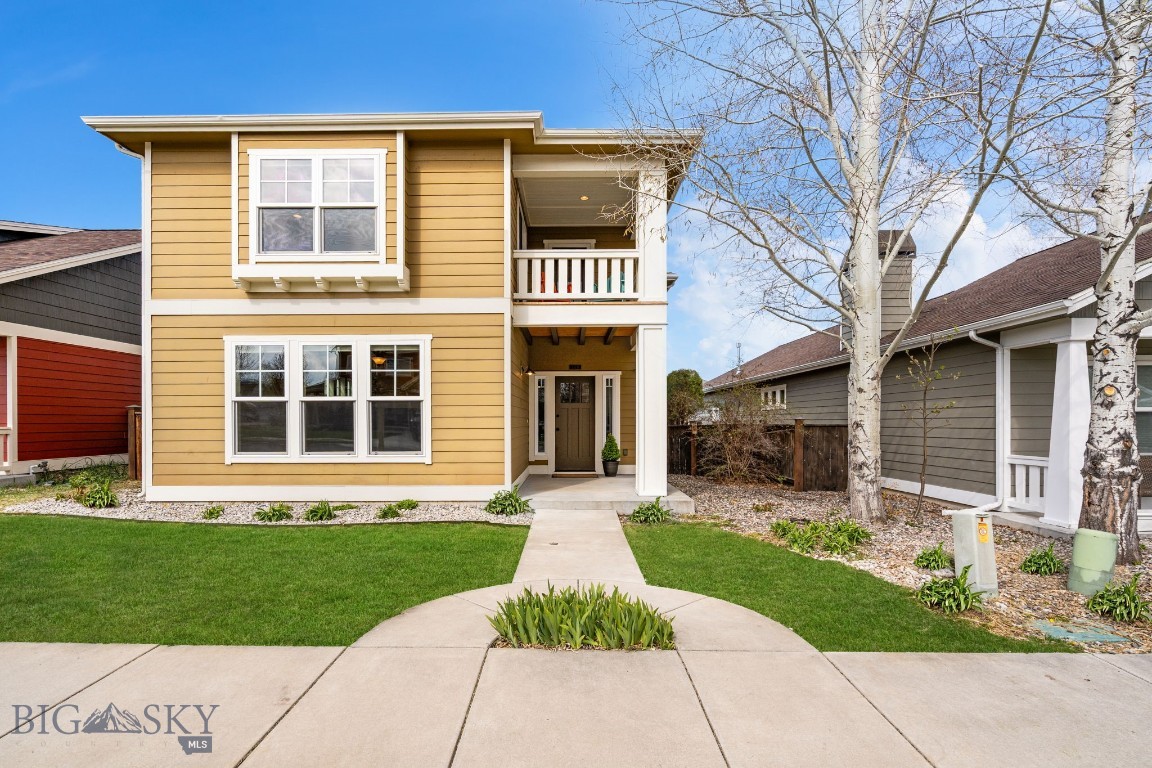 3179 Spring Ridge Drive Bozeman, MT 59715 - Photo 1 of 1 Inviting front exterior with thoughtfully landscaped yard- enhanced for seasonal presentation.