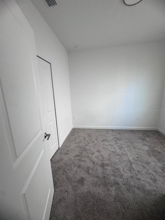 3071 Camden Way Davenport, FL 33837 - Photo 13 of 44 a view of an empty room