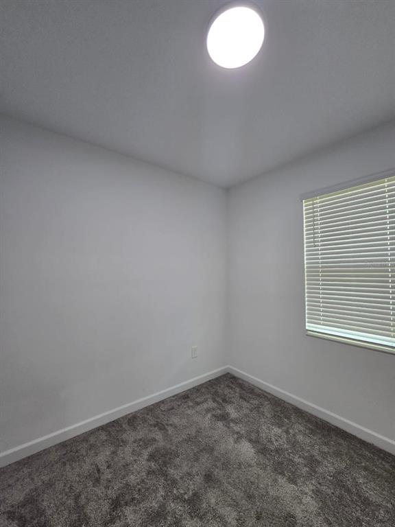 3071 Camden Way Davenport, FL 33837 - Photo 32 of 44 an empty room with a window