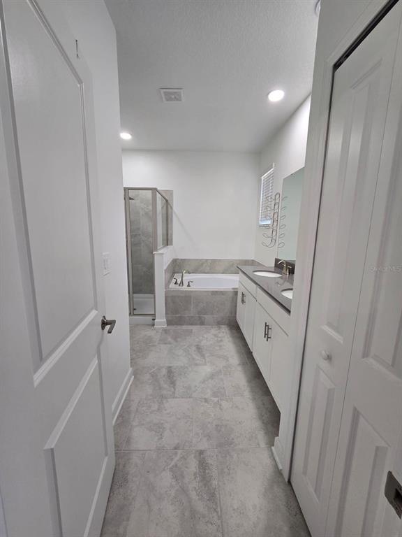 3071 Camden Way Davenport, FL 33837 - Photo 42 of 44 a view of a kitchen from the hallway