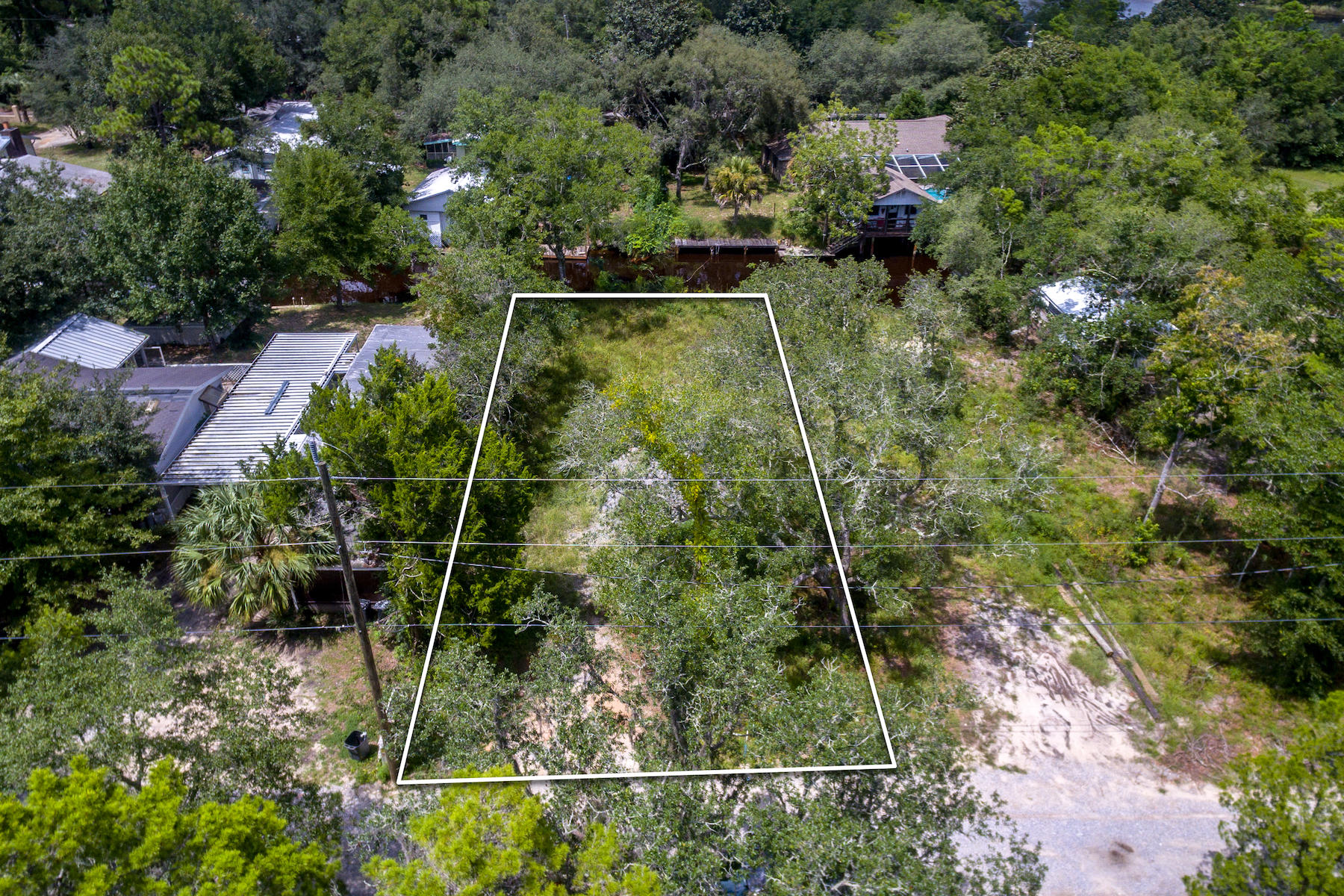 63 Bayou Road Santa Rosa Beach, FL 32459 - Photo 4 of 10 an aerial view of residential house with outdoor space