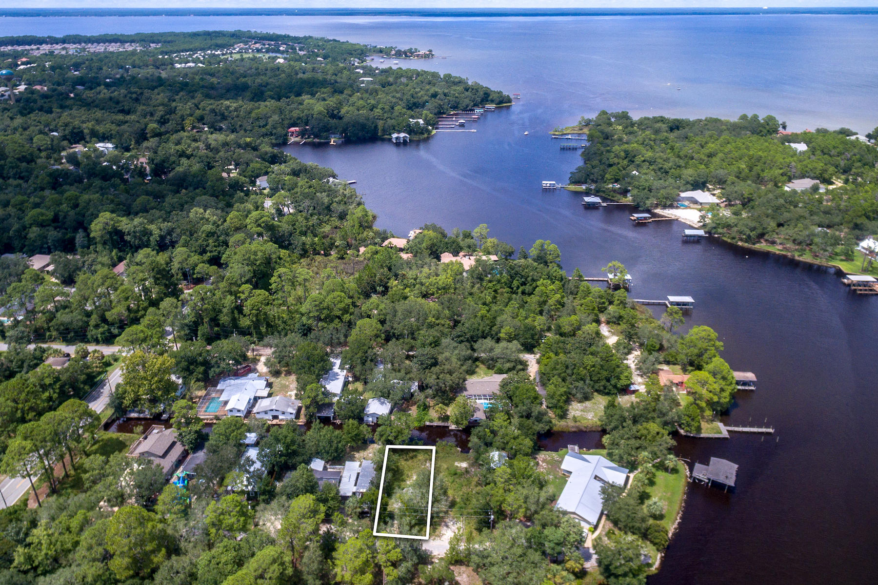 63 Bayou Road Santa Rosa Beach, FL 32459 - Photo 8 of 10 an aerial view of a house with a yard