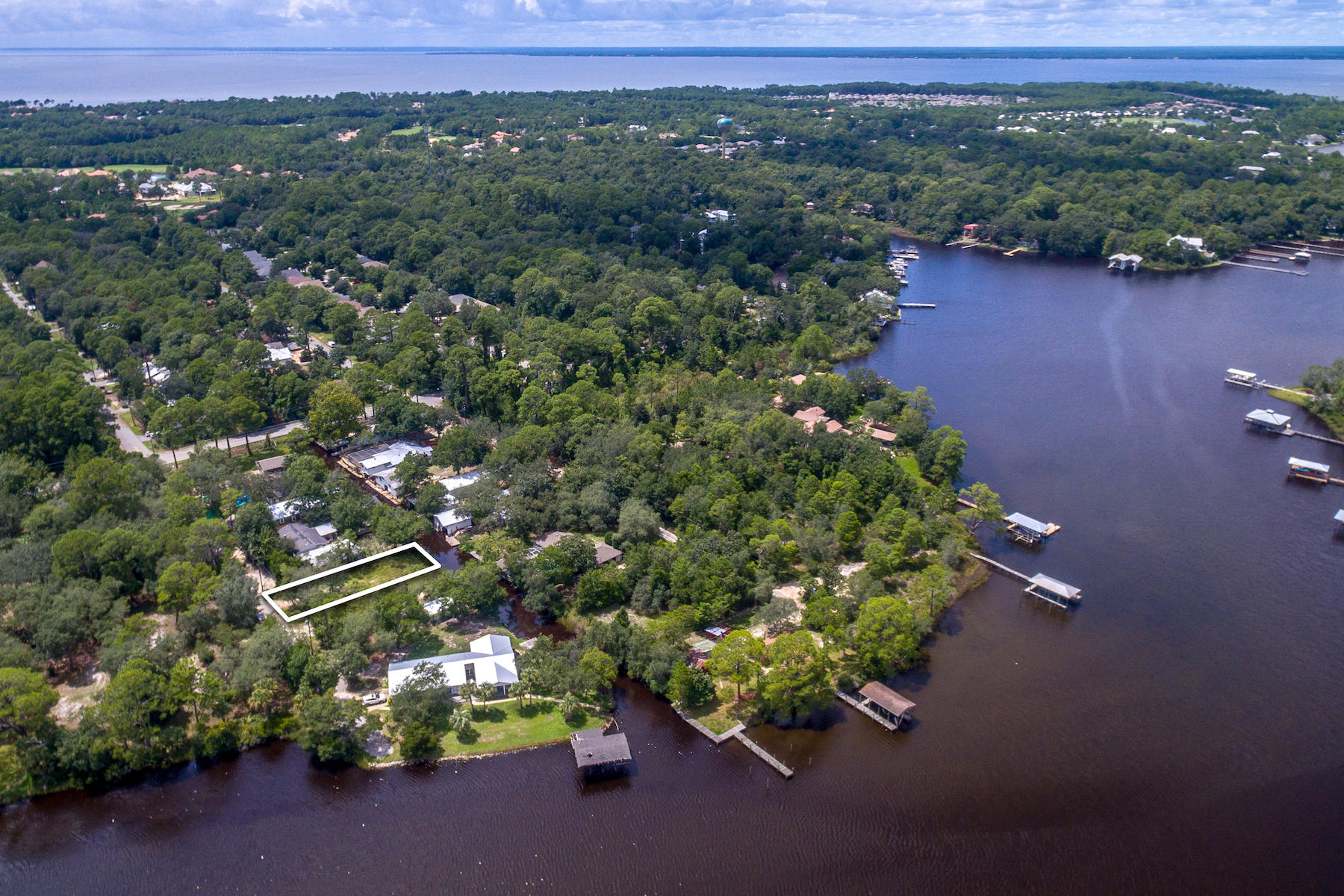 63 Bayou Road Santa Rosa Beach, FL 32459 - Photo 9 of 10 an aerial view of a house with a yard